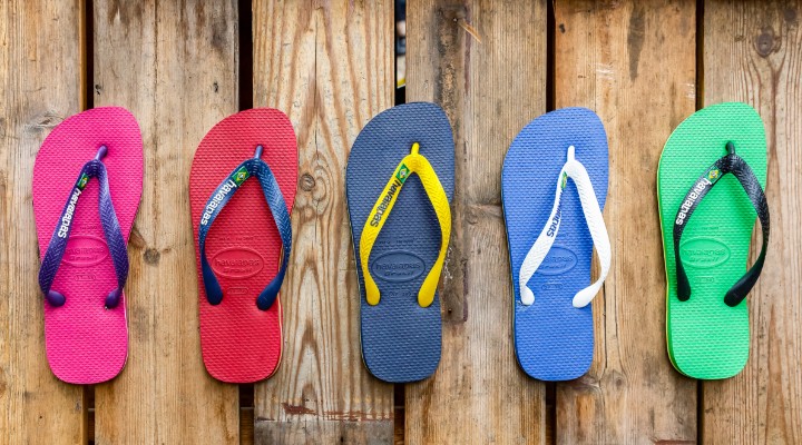 A row of multi-coloured Havaianas flip flops.