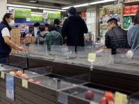 Hong Kong leader calls for calm, after supermarket shelves emptied
