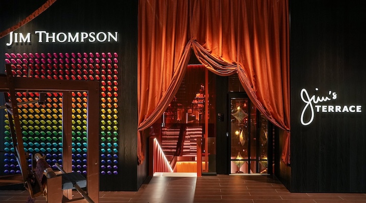The entrance to the bar – and the rainbow wall made from silk spools.