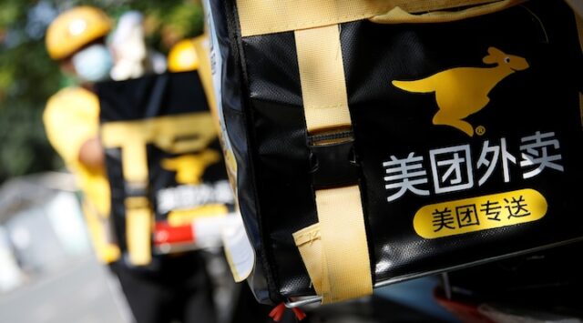 A sign of Meituan delivery service is seen on a delivery box on a scooter, in Beijing's Central Business District, China July 15, 2020.