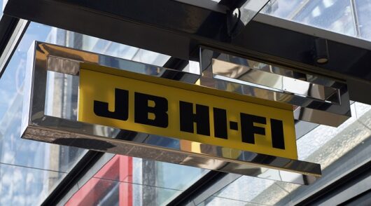 A closeup of a jb hi-fi store sign