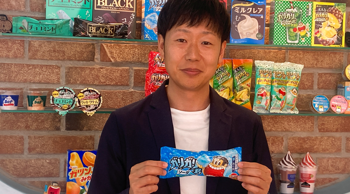 Hideyuki Okamoto, ice candy maker Akagi Nyugyo's marketing team leader, holds the company's flagship Garigari-kun candy bar at its headquarters in Saitama, Japan