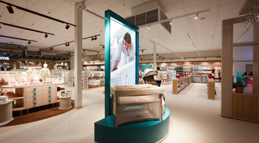 an interior shot of a baby bunting store showing a cot