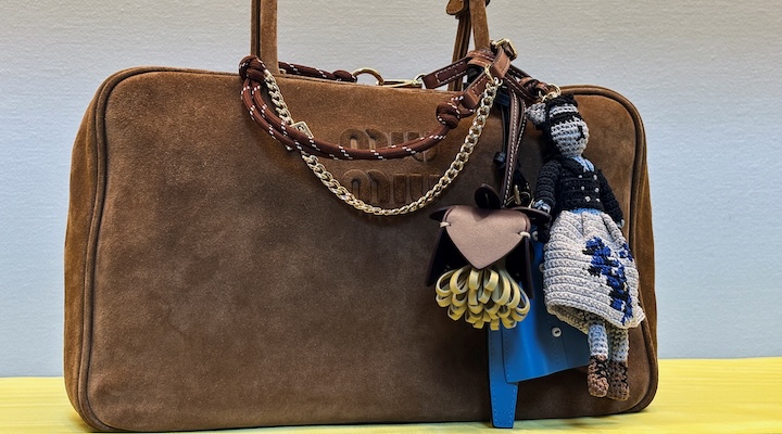 Miu Miu bag charms are displayed at their store.