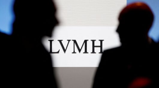 A logo of LVMH Moet Hennessy Louis Vuitton is seen on a wall before the presentation of LVMH Moet Hennessy Louis Vuitton's 2025 annual results in Paris