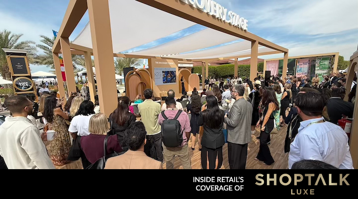 Delegates listen to a presentation at ShopTalk Luxe.