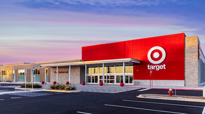 An exterior shot of a Target storefront and parking lot.