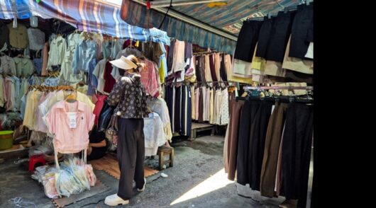 Counterfeit clothing at Hanoi market.