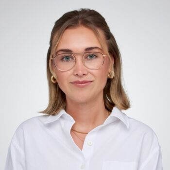 LeNose CEO Caroline Valentini posing against a gray background.